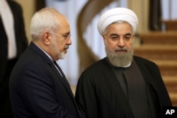 Eron Tashqi ishlar vaziri Javod Zarif va Prezident Hasan Ruhoniy