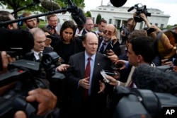 Sen. Chris Coons, D-Del., talks with reporters after all 100 U.S. senators were briefed on North Korea at the Eisenhower Executive Office Building on the White House complex, Washington, April, 26, 2017.