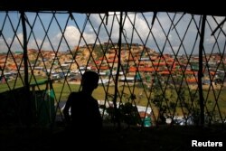 View of temporary shelters is seen through the shelter at Palong Khali refugee camp, near Cox's Bazar, Bangladesh, Nov. 14, 2017.