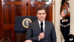 CNN journalist Jim Acosta does a standup before a new conference with President Donald Trump in the East Room of the White House in Washington, Nov. 7, 2018.