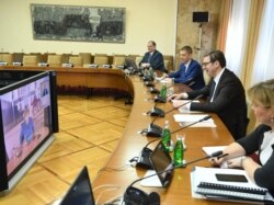 Video-konferencija predsednika Srbije Aleksandra Vučića i nemačke kancelarke Angele Merkel, tokom pandemije koronavirusa, u Beogradu, 18. marta 2020. (Foto: Fejsbuk stranica predsednika Srbije)