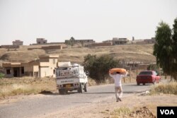 In areas of northern Iraq claimed by both federal authorities and the Kurdistan Region, many homes remain empty, with some people unable to go home and others afraid of renewed ethnic violence if they return, May 29, 2018, Hassan Sham, Iraqi Kurdistan. (H. Murdock/VOA)