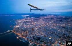 Solar Impulse 2 flies over San Francisco, Saturday, April 23, 2016. The solar-powered airplane, which is attempting to circumnavigate the globe to promote clean energy and the spirit of innovation, arrived from Hawaii after a three-day journey across the