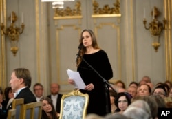 Sara Danius, Professor of Aesthetics, makes the traditional speech over her precursor Knut Ahnlund at the annual meeting of the Swedish Academy in the Old Town of Stockholm, Sweden