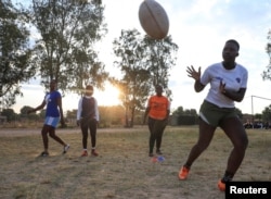 Members of the Zimbiru Rugby Academy Club, an all-female rugby team take part in a training session at Zimbiru primary school in Domboshava outside Harare, Zimbabwe, May 2, 2023. (REUTERS/Philimon Bulawayo)