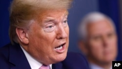 FILE - President Donald Trump speaks during a coronavirus task force briefing at the White House, April 4, 2020, in Washington.