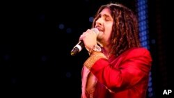 FILE - Indian Bollywood singer Sonu Nigam performed at The Asian Awards at Grosvenor House Hotel, Park Lane, London, Oct. 26, 2010. 