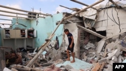 Nyumba iliyoharibiwa na shambulizi la bomu la Israel huko Zawayda katikati mwa Ukanda wa Gaza, Julai 7, 2024. Picha ya AFP
