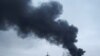 Фото для ілюстрації: дим від удару Росії по високовольтній лінії поблизу Харкова, 22 березня 2024 року