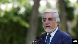 FILE - Abdullah Abdullah, Chairman of the High Council for National Reconciliation, speaks during a press conference in Kabul, Afghanistan, May 30, 2020.