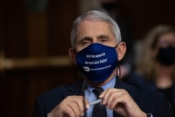 Dr. Anthony Fauci, Director of the National Institute of Allergy and Infectious Diseases, listens during a Senate Senate Health, Education, Labor, and Pensions Committee Hearing on the federal government response to COVID-19 Capitol Hill, Sept. 23, 2020.