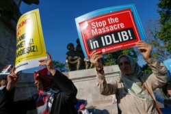 Members of pro-Islamic groups stage a rally to defend Syrian refugees and migrants, in Istanbul, July 27, 2019.