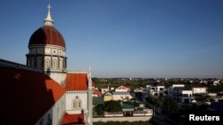 The dome of Phu Tang church is seen among newly-built houses at Do Thanh commune, in Nghe An province, Vietnam October 29, 2019. Picture taken October 29, 2019. (REUTERS/Kham)