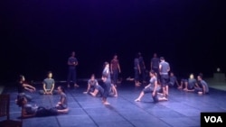 Before the show starts, the group of 19 young Cambodian circus performers prepared to platform at the International School of Phnom Penh. (Sayana Ser/VOA) 