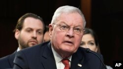 FILE - Keith Kellogg, AFPI Co-Chair of the Center for American Security, center, speaks during a Senate Armed Services Committee full committee hearing on the conflict in Ukraine, Feb. 28, 2023, on Capitol Hill in Washington. 