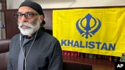 ཁ་ལི་སི་ཐན་གྱི་ལས་འགུལ་བ་སིག་རྒྱ་བོ་གུར་པ་ཏ་ཝན་ཏ་སིང་པན་ནུན་