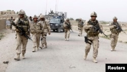 د کندهار په ډنډ ولسوالۍ کې د بهرنیو سرتیرو گزمه - عکس ارشیف