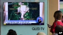 Picha za satellite zikionyesha maeneo ya vituo vya kurushia makombora nchini Korea Kaskazini iliyokuwa ikionyeshwa katika televisheni ya Korea Kusini, Julai 24, 2018. 
