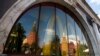 The walls and towers of the Kremlin are reflected in a window of a closed McDonald's restaurant, one of four temporarily closed by the state food safety watchdog, in Moscow, August 21, 2014. Russia ordered the temporary closure of four McDonald's restaura
