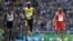 Jamaica's Usain Bolt, center, Trinidad and Tobago's Richard Thompson, right, and Britain's James Dasaolu compete in a men's 100-meter heat during the athletics competitions of the 2016 Summer Olympics at the Olympic stadium in Rio de Janeiro, Brazil, Aug.