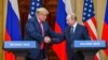 Presiden AS Donald Trump (kiri) dan Presiden Rusia Vladimir Putin berjabat tangan sebelum menghadiri konferensi pers bersama setelah pertemuan di Istana Kepresidenan di Helsinki, pada 16 Juli 2018. (Foto: AFP)
