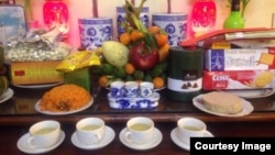 A traditional offering of food to ancestors on the eve of Tet in Vietnam.