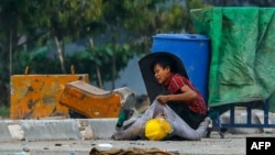 မတ်လ ၁၄ ရက်နေ့ လှိုင်သာယာဆန္ဒပြပွဲ ဖြိုခွင်းမှုအတွင်းတွေ့ရတဲ့ မြင်ကွင်း။ (မတ် ၁၄၊ ၂၀၂၁)