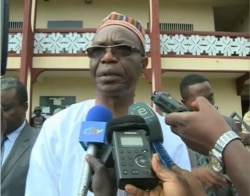 FILE - Governor Deben Tchoffo visited the Presbyterian school where 80 students and their principal were kidnapped in Bafut, near Bamenda, Cameroon, Nov. 5, 2018.