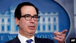 FILE - U.S. Treasury Secretary Steven Mnuchin speaks about the coronavirus in the James Brady Press Briefing Room at the White House, in Washington, April 13, 2020.