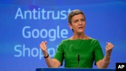 European Union Commissioner for Competition Margrethe Vestager speaks during a media conference at EU headquarters in Brussels on Tuesday, June 27, 2017. The European Union's competition watchdog has fined internet giant Google over its online shopping service. (AP Photo/Virginia Mayo)