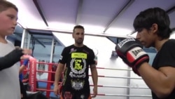 Kickboxing Champion Gives Young Migrants Hope