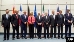 FILE - Leaders who were involved in Iran nuclear talks are seen posing for a group photo in Vienna, Austria, July 14, 2015. 