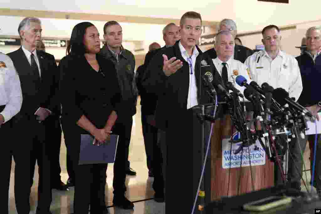 Transportation Secretary Sean Duffy, with District of Columbia Mayor Muriel Bowser, left, and other officials, speaks during a news conference at Ronald Reagan Washington National Airport, Jan. 30, 2025, in Arlington.