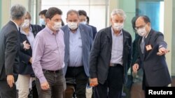 French Senator Alain Richard leads a group of delegates arriving at Taoyuan International airport in Taoyuan, Taiwan, October 6, 2021. 