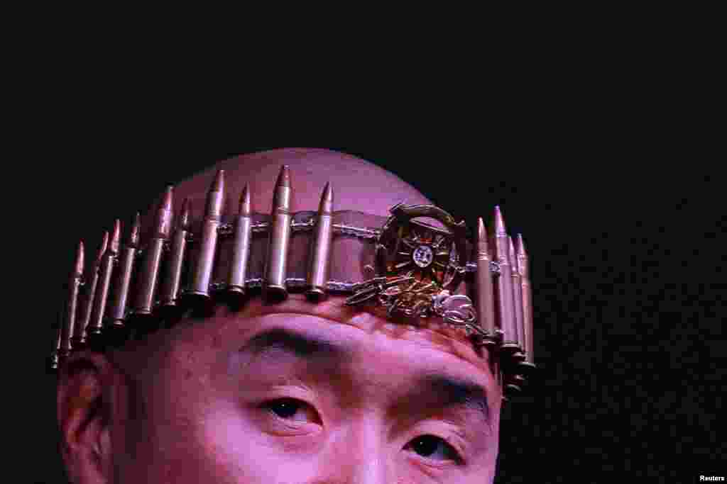 Pastor H. J. Sean Moon of the World Peace and Unification Sanctuary Church speaks at the Rod of Iron Freedom Festival, which the organizers call "the largest open carry rally in America," in Greeley, Pennsylvania, Oct. 13, 2024.