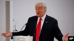 ប្រធានាធិបតី​សហរដ្ឋ​អាមេរិក​លោក Donald Trump ថ្លែង​ក្នុង​កិច្ចប្រជុំ G20 ក្នុង​ក្រុង Hamburg ប្រទេស​អាល្លឺម៉ង់ កាលពី​ថ្ងៃទី៨ ខែកក្កដា ឆ្នាំ២០១៧។