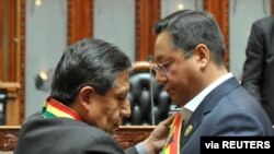 El presidente de Bolivia Luis Arce y el vicepresidente David Choquehuanca, durante la toma de posesión el 8 de noviembre de 2020, en La Paz, Bolivia..