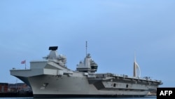 英国皇家海军“伊丽莎白女王”号（HMS Queen Elizabeth）航母停泊在英国南部一个港口。 （2019年6月5日）
