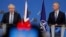 英國首相約翰遜（左）和北約秘書長斯托爾滕貝格在記者會上。