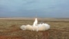 This photo taken from video provided by the Russian Defense Ministry Press Service Feb. 19, 2022, shows a Russian Iskander-K missile launched during a military exercise at a training ground in Russia. 