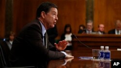 Джеймс Комі