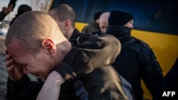 Колишні військовополонені українці після обміну 31 січня 2024 року