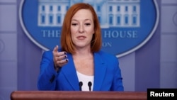 FILE - White House Press Secretary Jen Psaki addresses the daily press briefing at the White House in Washington, Oct. 26, 2021.