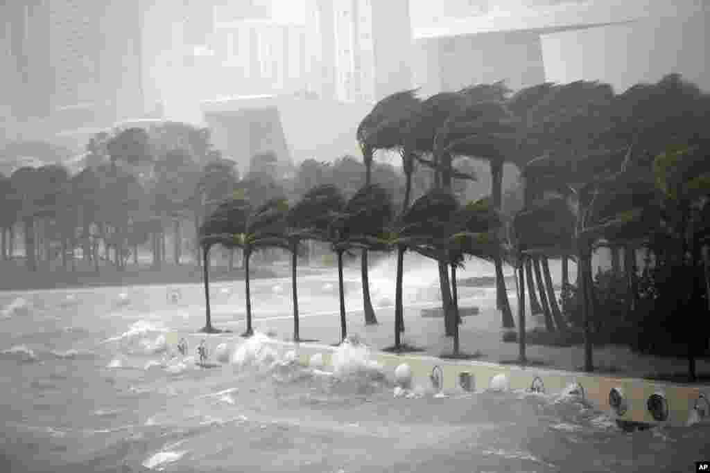 Waves crash over a seawall from Biscayne Bay as Hurricane Irma passes by in Miami, Florida, Sept. 10, 2017.