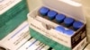 FILE -- Measles, mumps and rubella vaccines sit in a cooler at the Rockland County Health Department in Pomona, N.Y., March 27, 2019. 