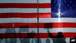 Приблизно шість із десяти (61%) американців вважають Росію ворогом, показали результати опитування. AP Photo/John Locher