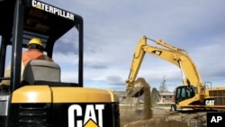 FILE - Caterpillar machinery