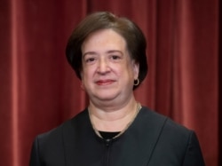 FILE - Associate Justice Elena Kagan sits with fellow Supreme Court justices for a group portrait at the Supreme Court Building in Washington, Nov. 30, 2018.