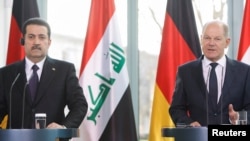 ڕاوێژکاری ئەڵمانیا و سەرۆک وەزیرانی عێراق لە کۆنگرەیەکی ڕۆژنامەوانی هاوبەشدا لە بەرلین