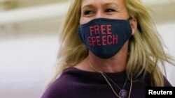 U.S. Representative Marjorie Taylor Greene (R-GA) heads to the U.S. Capitol prior to a vote in the U.S. House of Representives on a resolution that would punish her for remarks supporting violence against Democrats, on Capitol Hill, Feb. 4, 2021.